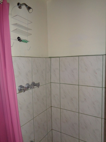 Imagen de la habitación del Hotel Ann's Villa. Foto 8