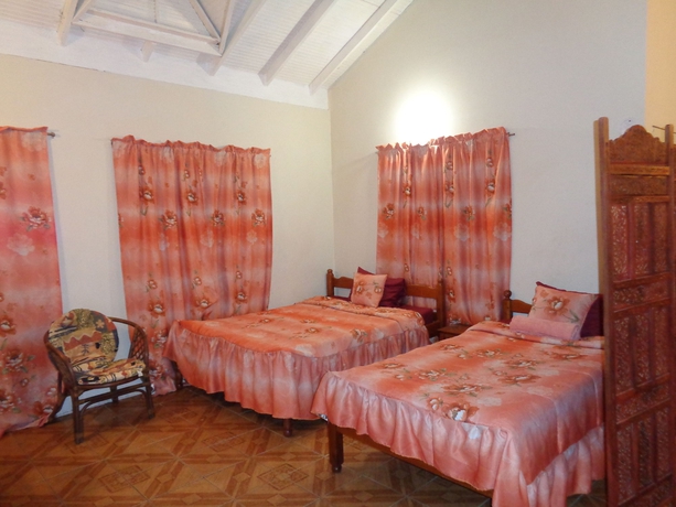 Imagen de la habitación del Hotel Ann's Villa. Foto 10