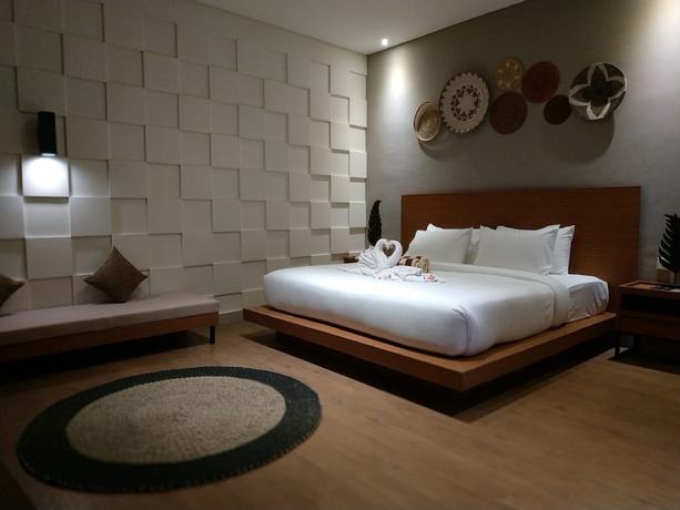 Imagen de la habitación del Hotel Annupuri Villas Bali. Foto 10