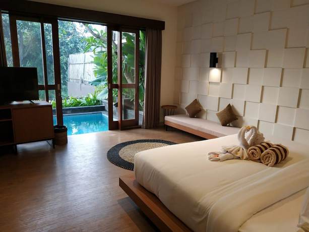 Imagen de la habitación del Hotel Annupuri Villas Bali. Foto 11