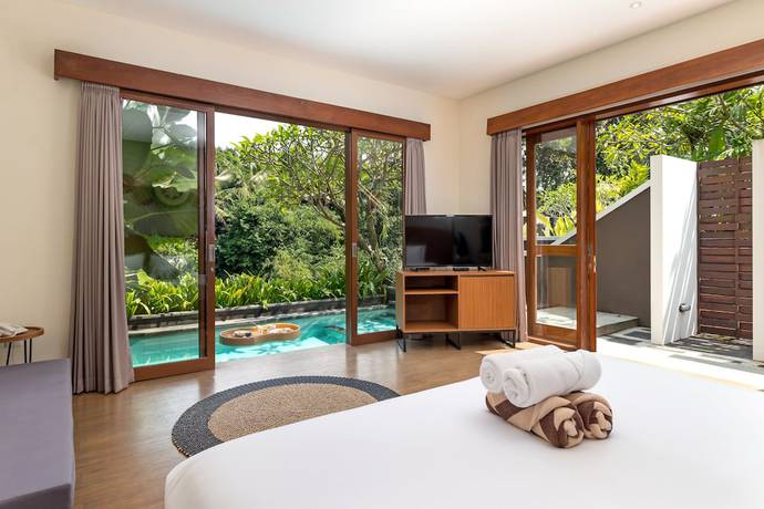 Imagen de la habitación del Hotel Annupuri Villas Bali. Foto 12