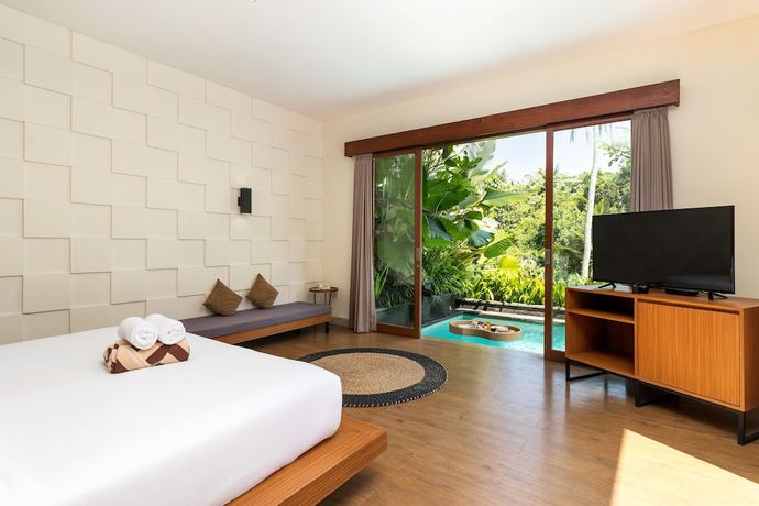 Imagen de la habitación del Hotel Annupuri Villas Bali. Foto 15