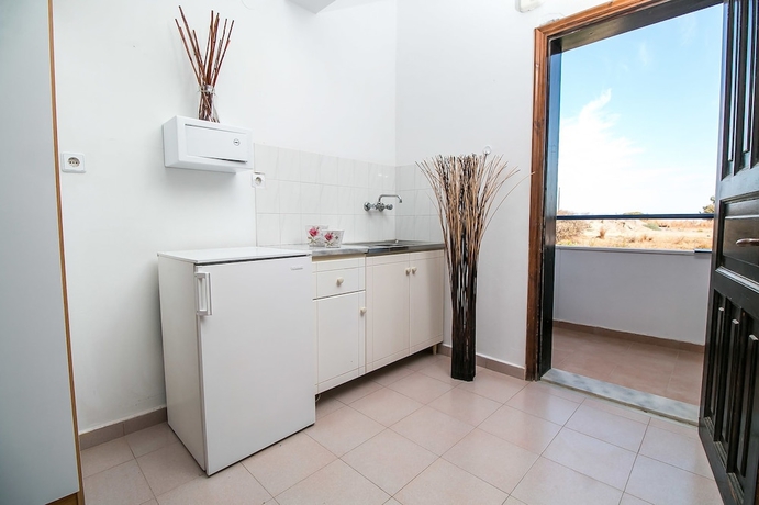 Imagen de la habitación del Hotel Ano Kampos and Studios. Foto 12