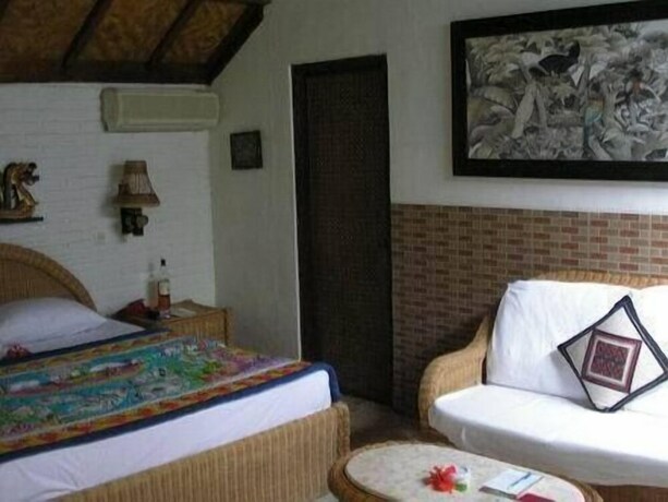 Imagen de la habitación del Hotel Anom Beach. Foto 15