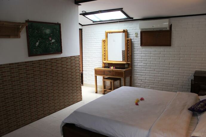Imagen de la habitación del Hotel Anom Beach. Foto 16