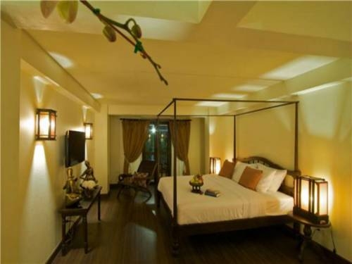 Imagen de la habitación del Hotel Anoma Boutique House. Foto 23