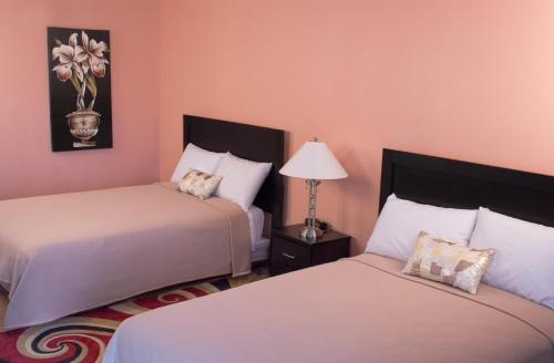 Imagen de la habitación del Hotel Ans Inn and Suites. Foto 9