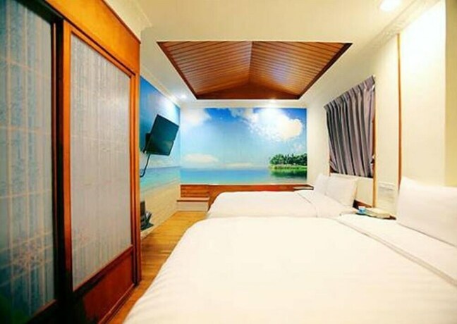 Imagen de la habitación del Hotel Anshun. Foto 23