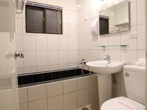 Imagen de la habitación del Hotel Anshun. Foto 25