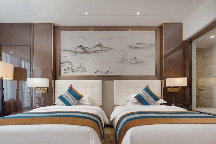 Imagen de la habitación del Hotel Anshun Perenc Hotel. Foto 3