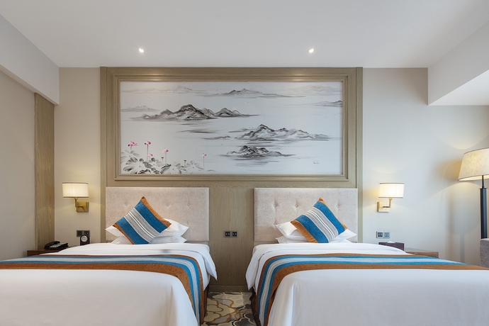 Imagen de la habitación del Hotel Anshun Perenc Hotel. Foto 5