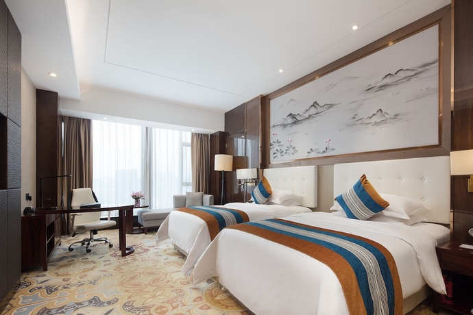 Imagen de la habitación del Hotel Anshun Perenc Hotel. Foto 12