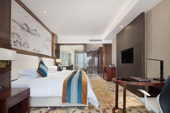 Imagen de la habitación del Hotel Anshun Perenc Hotel. Foto 13