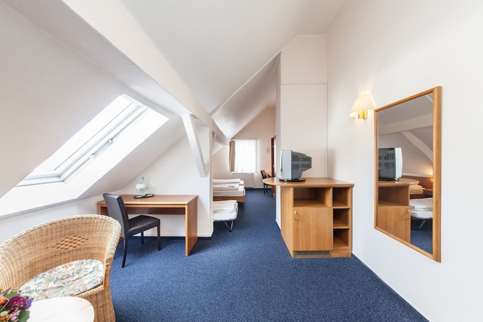 Imagen de la habitación del Hotel Antares Düsseldorf. Foto 2