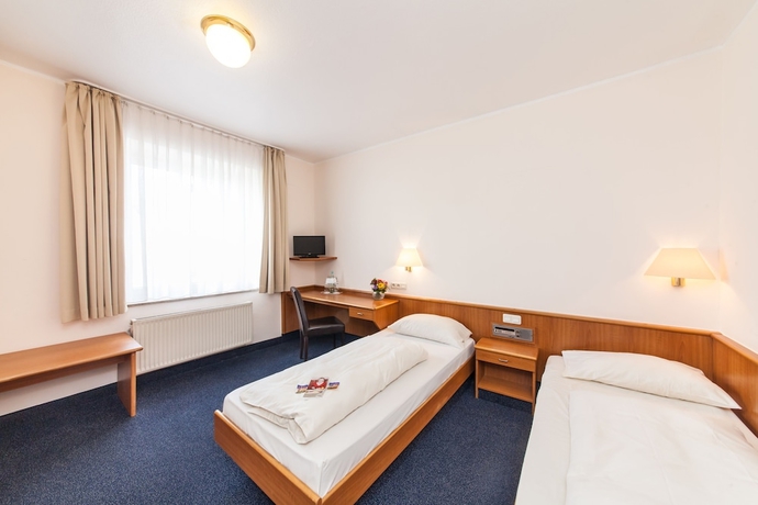 Imagen de la habitación del Hotel Antares Düsseldorf. Foto 8