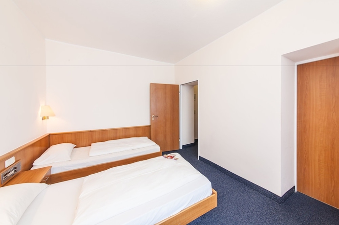 Imagen de la habitación del Hotel Antares Düsseldorf. Foto 10