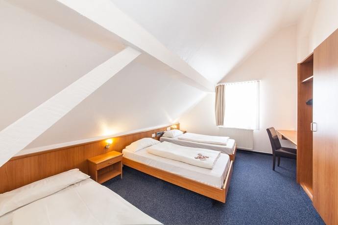 Imagen de la habitación del Hotel Antares Düsseldorf. Foto 11