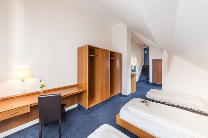 Imagen de la habitación del Hotel Antares Düsseldorf. Foto 14