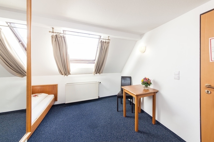 Imagen de la habitación del Hotel Antares Düsseldorf. Foto 17