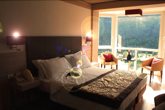 Imagen de la habitación del Hotel Antelao Dolomiti Mountain Resort. Foto 12