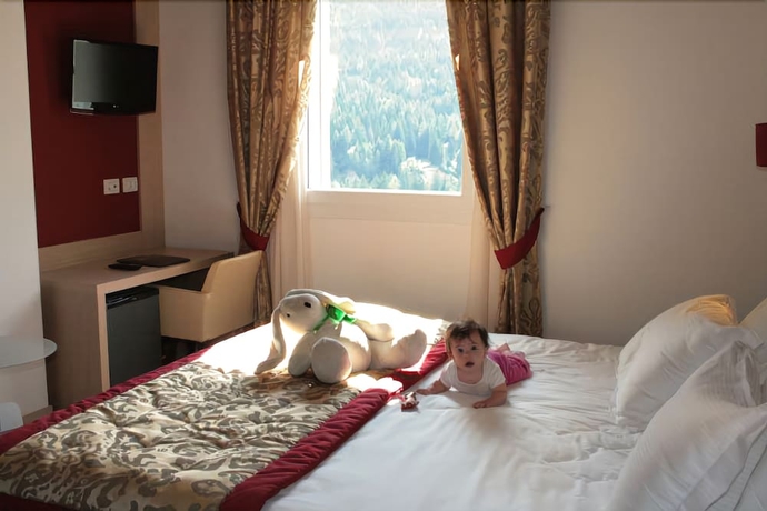 Imagen de la habitación del Hotel Antelao Dolomiti Mountain Resort. Foto 15