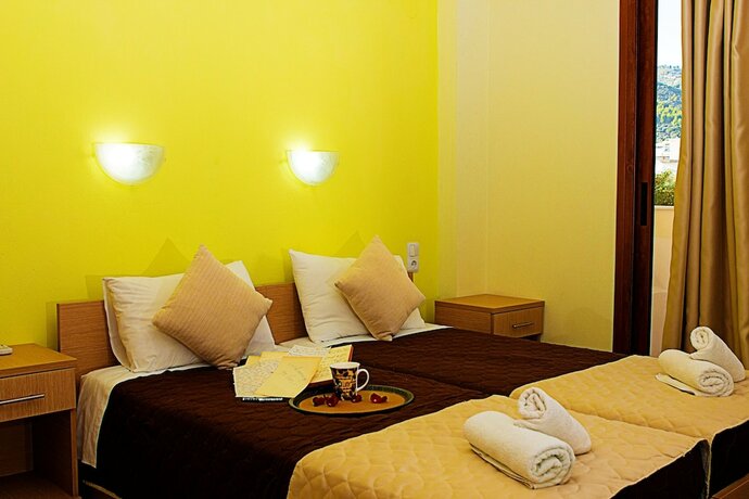 Imagen de la habitación del Hotel Anthena Studios. Foto 18