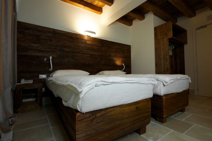 Imagen de la habitación del Hotel Antica Abbazia. Foto 15