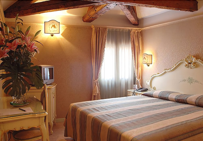 Imagen de la habitación del Hotel Antica Locanda Al Gambero. Foto 13