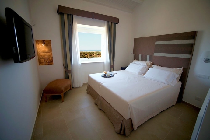 Imagen de la habitación del Hotel Antica Locanda Del Golf. Foto 15