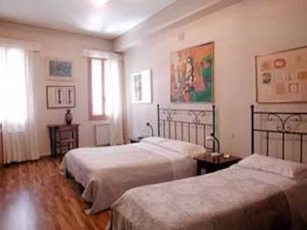 Imagen de la habitación del Hotel Antica Locanda Montin. Foto 12