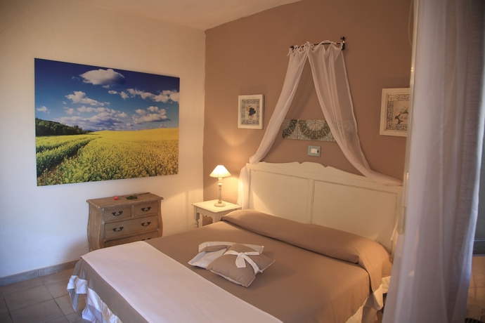Imagen de la habitación del Hotel Antica Masseria Rottacapozza. Foto 7
