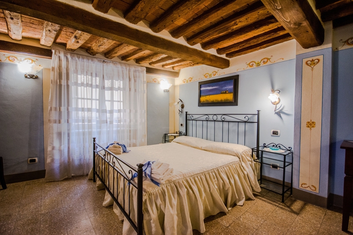 Imagen de la habitación del Hotel Antica Residenza Del Gallo. Foto 7