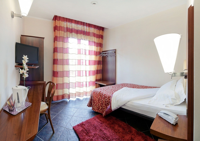 Imagen de la habitación del Hotel Antico Albergo Madonna. Foto 3