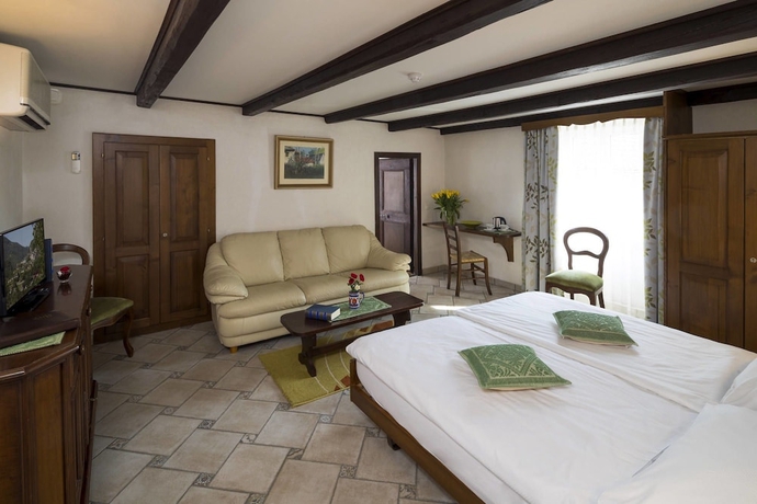 Imagen de la habitación del Hotel Antico. Foto 4