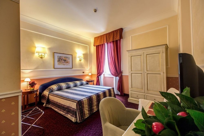 Imagen de la habitación del Hotel Antico Palazzo Rospigliosi. Foto 2