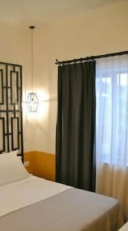 Imagen de la habitación del Hotel Antigone. Foto 10