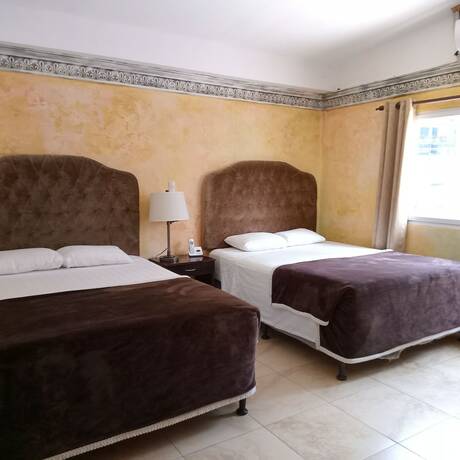 Imagen de la habitación del Hotel Antigua Inn. Foto 12