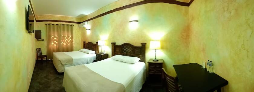 Imagen de la habitación del Hotel Antigua Inn. Foto 14