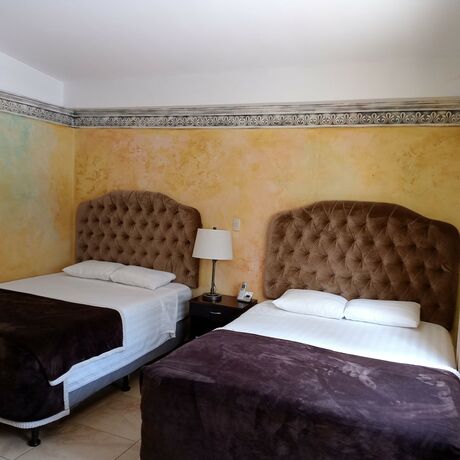 Imagen de la habitación del Hotel Antigua Inn. Foto 20