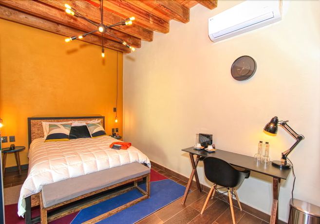 Imagen de la habitación del Hotel Antigua Trece Fusión. Foto 7
