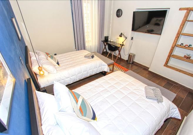 Imagen de la habitación del Hotel Antigua Trece Fusión. Foto 8