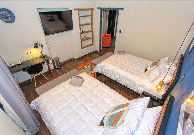 Imagen de la habitación del Hotel Antigua Trece Fusión. Foto 9