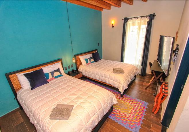 Imagen de la habitación del Hotel Antigua Trece Fusión. Foto 13