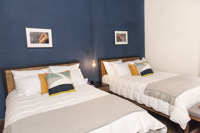 Imagen de la habitación del Hotel Antigua Trece Fusión. Foto 14