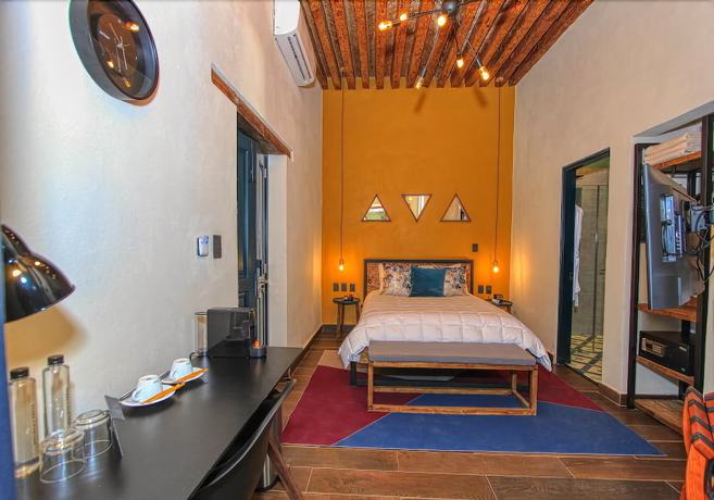 Imagen de la habitación del Hotel Antigua Trece Fusión. Foto 16