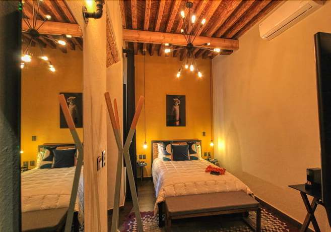 Imagen de la habitación del Hotel Antigua Trece Fusión. Foto 17