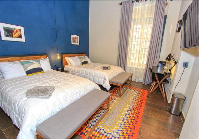 Imagen de la habitación del Hotel Antigua Trece Fusión. Foto 19