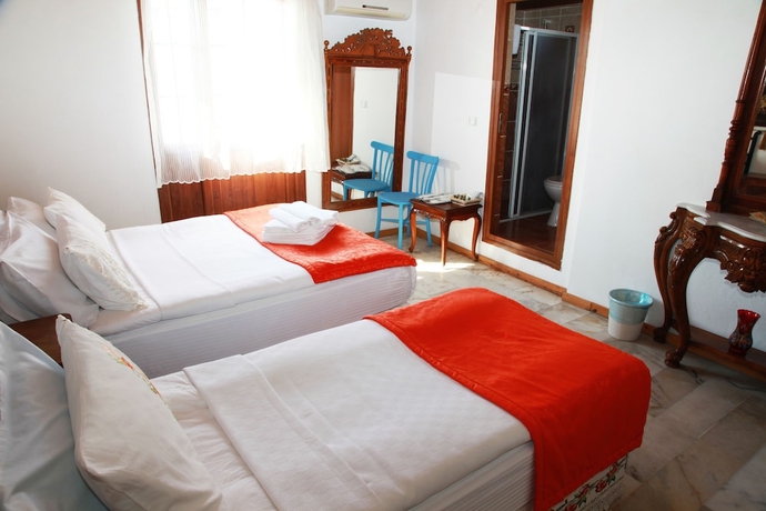 Imagen de la habitación del Hotel Antik Motel. Foto 4