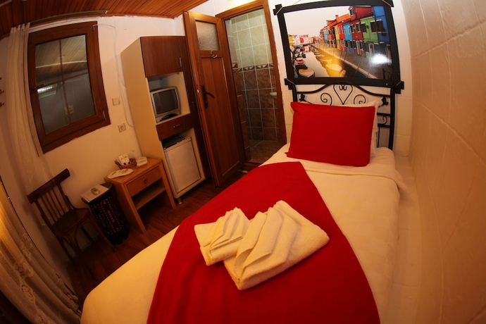 Imagen de la habitación del Hotel Antik Motel. Foto 15
