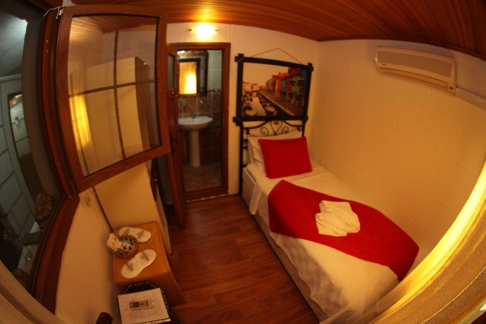 Imagen de la habitación del Hotel Antik Motel. Foto 17